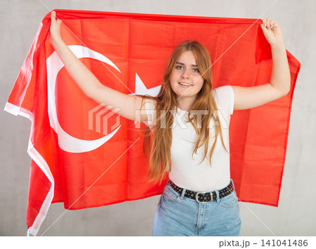 Positive girl with Turkey flag rooting for your favorite team 141041486