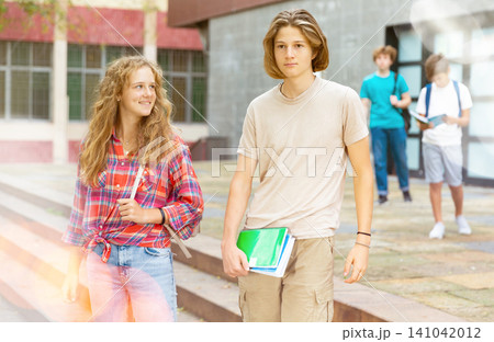 Teens coming home after school classes 141042012
