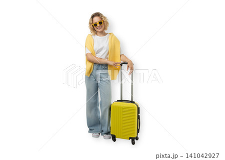 Woman stands with yellow suitcase and smiles happily, PNG Woman stands with yellow suitcase and smiles happily, PNG 141042927