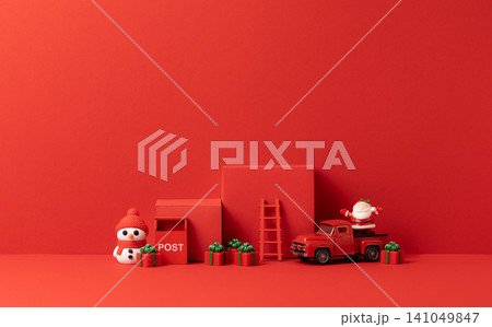 Empty red product podiums staged with a snowman figurine, toy mail truck with Santa and gift boxes, designed for holiday product mockups and advertising layouts. Empty red product podiums staged with a snowman figurine, toy mail truck with Santa and gift boxes, designed for holiday product mockups and advertising layouts. 141049847