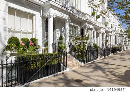 Luxury residential street with white houses in London Luxury residential street with white houses in London 141049874