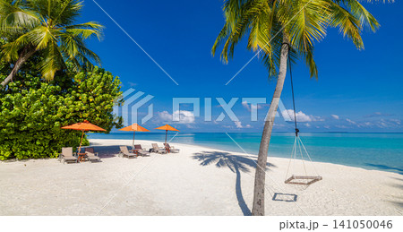 Idyllic tropical beach, palm trees, sun loungers, turquoise sea, white sand paradise. Luxury summer resort escape, romantic couple vacation getaway. Relaxing honeymoon travel destination wallpaper Idyllic tropical beach, palm trees, sun loungers, turquoise sea, white sand paradise. Luxury summer resort escape, romantic couple vacation getaway. Relaxing honeymoon travel destination wallpaper 141050046