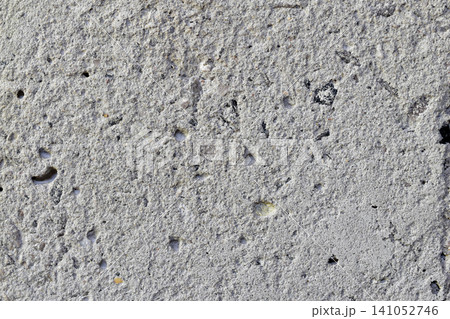Textured pattern of a concrete wall. Textured pattern of a concrete wall. 141052746