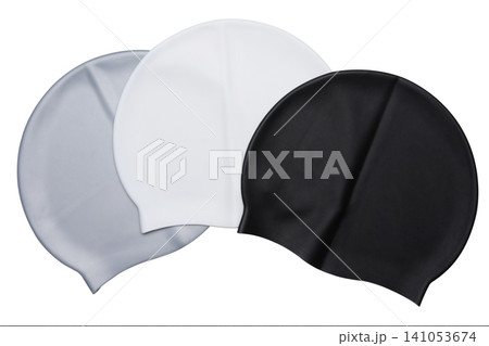 Three silicone swimming caps in black, white, and silver gray colors isolated on white background, monochrome set of waterproof swim hats 141053674