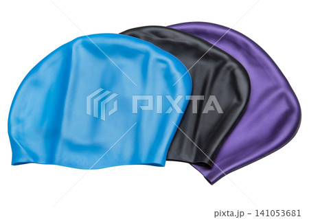 Three silicone swimming caps for long hair in blue, black, and purple colors isolated on white background, extra volume swim hats set Three silicone swimming caps for long hair in blue, black, and purple colors isolated on white background, extra volume swim hats set 141053681