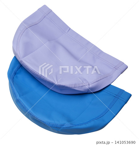 Two pastel fabric swimming caps in lavender and blue colors isolated on white background, pair of textile swim hats Two pastel fabric swimming caps in lavender and blue colors isolated on white background, pair of textile swim hats 141053690