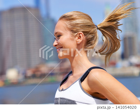 Woman, happy and running for fitness in city, jogging active and fit female person exercising in New York. Energy, marathon for sports training and workout for athlete, cardio wellness and endurance Woman, happy and running for fitness in city, jogging active and fit female person exercising in New York. Energy, marathon for sports training and workout for athlete, cardio wellness and endurance 141054020