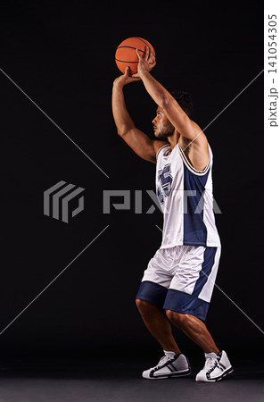 Man, shoot and basketball player in studio for game goals or workout competition, training or black background. Male person, playing and exercise performance or professional, fitness or mockup space Man, shoot and basketball player in studio for game goals or workout competition, training or black background. Male person, playing and exercise performance or professional, fitness or mockup space 141054305