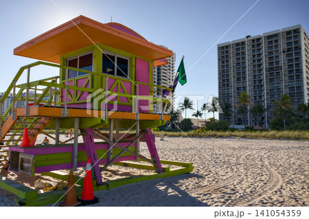 Colorful Lifeguard Tower Standing on Sandy Beach Colorful Lifeguard Tower Standing on Sandy Beach 141054359
