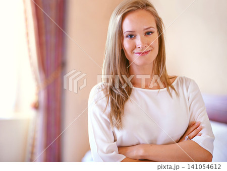 Crossed arms, happy and portrait of woman in bedroom with happiness, confidence and pride in home. Fashion, beauty and face of person in house with casual style, trendy outfit and clothes on weekend 141054612