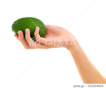 Nutrition, avocado and hand in studio for healthy diet, wellness and vitamin c on white background. Fruit, green and holding for delicious ingredients, organic food and vegetarian meal with mockup Nutrition, avocado and hand in studio for healthy diet, wellness and vitamin c on white background. Fruit, green and holding for delicious ingredients, organic food and vegetarian meal with mockup 141054644
