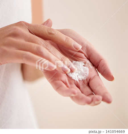 Woman, hands or cream product for beauty, skincare or cosmetics application for moisturiser or anti aging. Fingers, closeup or person with smooth skin, shine or cream for glow or dermatology in home 141054669