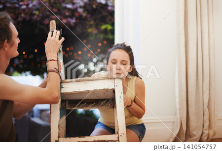 People, chair and furniture sanding in home as couple for maintenance project, construction or living room. Man, woman and bonding in new apartment for antique decor, creative woodwork or carpenter People, chair and furniture sanding in home as couple for maintenance project, construction or living room. Man, woman and bonding in new apartment for antique decor, creative woodwork or carpenter 141054757