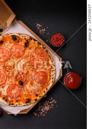 Italian pizza margherita with cheese, tomatoes, and tomato sauce, fast food. Pizza margherita Italian pizza margherita with cheese, tomatoes, and tomato sauce, fast food. Pizza margherita 141056637