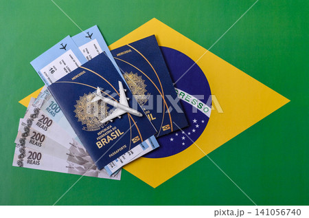 Brazil, Brazilian passport or id document with tickets for flight, travel. Brazilian passport Brazil, Brazilian passport or id document with tickets for flight, travel. Brazilian passport 141056740