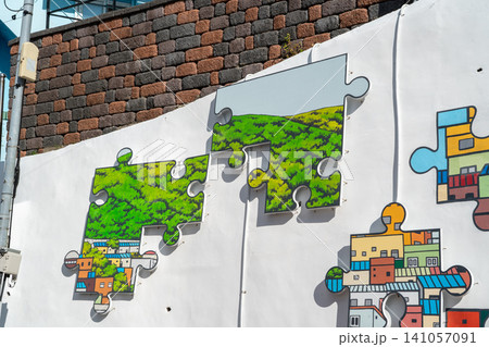 Gamcheon Culture Village, Busan, South Korea - Nov. 09, 2024: Artistic mural wall paintings. 141057091