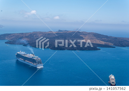 Cruise ships near Nea Kameni volcanic island in Santorini 141057562
