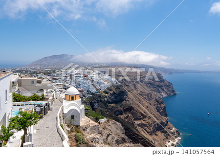 Panoramic view of Fira town and caldera cliffs in Santorini Greece Panoramic view of Fira town and caldera cliffs in Santorini Greece 141057564