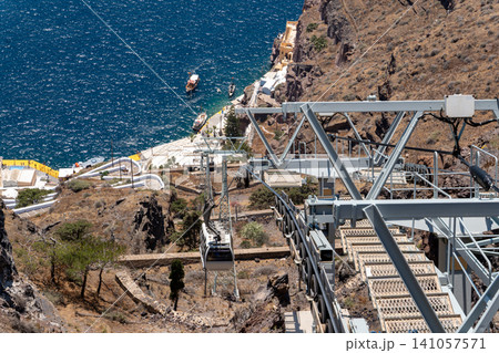 Santorini cable car descending toward old port in Fira Santorini cable car descending toward old port in Fira 141057571