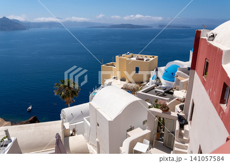 Scenic Oia village buildings overlooking Aegean Sea in Santorini Scenic Oia village buildings overlooking Aegean Sea in Santorini 141057584