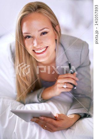 Business, woman and technology in bedroom with portrait for corporate planning, digital tablet and happiness. Professional, person and touchscreen for writing review notes or internet search in hotel 141057893