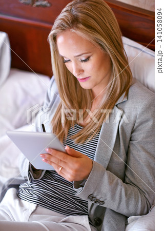 Business, woman and technology on bed with research for corporate planning, digital tablet and work schedule. Professional, person and top view for writing review notes and internet search in hotel Business, woman and technology on bed with research for corporate planning, digital tablet and work schedule. Professional, person and top view for writing review notes and internet search in hotel 141058094