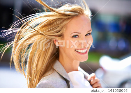 Businesswoman, portrait and city walking with wind to office building or corporate professional, commute or urban. Female person, face and smile in New York or work trip in morning, street or career Businesswoman, portrait and city walking with wind to office building or corporate professional, commute or urban. Female person, face and smile in New York or work trip in morning, street or career 141058095