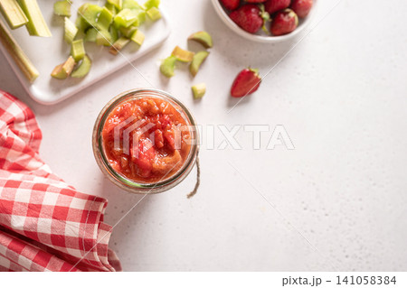 Homemade strawberry rhubarb jam with fresh strawberries and rhubarb Homemade strawberry rhubarb jam with fresh strawberries and rhubarb 141058384
