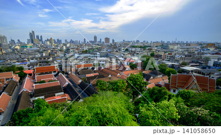 Aerial cityscape view with red temple roofs and skyline Aerial cityscape view with red temple roofs and skyline 141058650