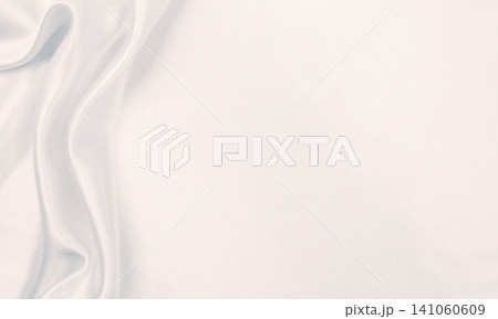 Smooth elegant grey silk or satin luxury cloth as wedding background. Luxurious Christmas background or New Year background design Smooth elegant grey silk or satin luxury cloth as wedding background. Luxurious Christmas background or New Year background design 141060609