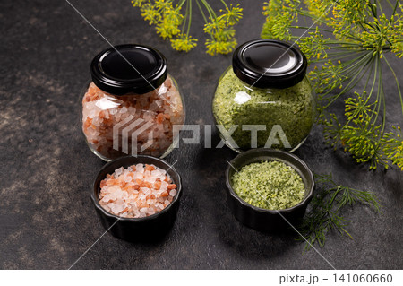 Himalayan pink and herb salts in jars and bowls Himalayan pink and herb salts in jars and bowls 141060660
