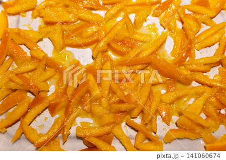 Top view of homemade candied orange peels drying Top view of homemade candied orange peels drying 141060674