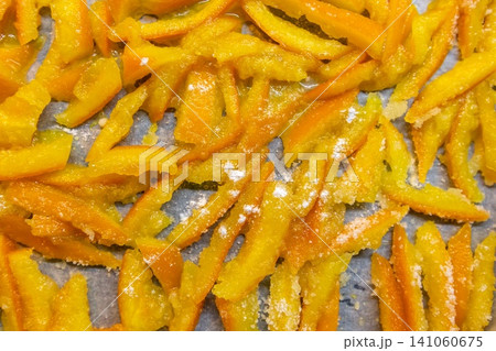 Top view of homemade candied orange peels drying Top view of homemade candied orange peels drying 141060675