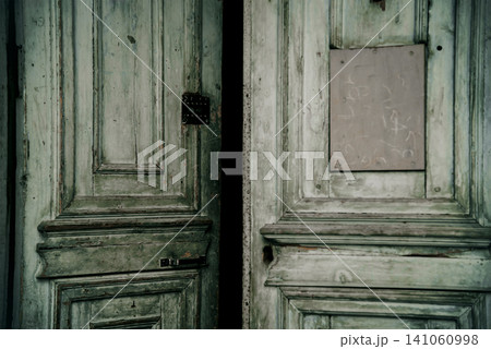 Entrance door small residential house in neighborhood, exterior building outside Entrance door small residential house in neighborhood, exterior building outside 141060998