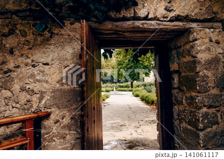 Entrance door small residential house in neighborhood, exterior building outside Entrance door small residential house in neighborhood, exterior building outside 141061117
