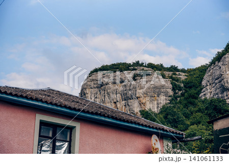 Small residential house cottage in suburbs neighborhood country exterior outside 141061133