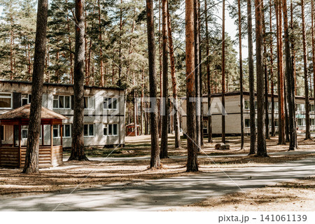 Old brick buildings Soviet pioneer camp on territory of desert pine forest park Old brick buildings Soviet pioneer camp on territory of desert pine forest park 141061139