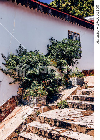 Entrance door small residential house in neighborhood, exterior building outside Entrance door small residential house in neighborhood, exterior building outside 141061160