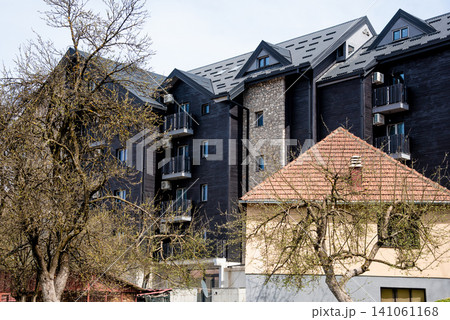 Modern multi-storey city residential apartment house, exterior building outdoor 141061168