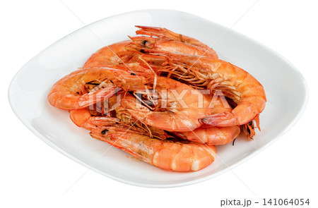 Freshly cooked whole king prawns served on a white ceramic plate. Delicious orange boiled shrimp with heads and shells intact. Gourmet seafood appetizer isolated. Freshly cooked whole king prawns served on a white ceramic plate. Delicious orange boiled shrimp with heads and shells intact. Gourmet seafood appetizer isolated. 141064054