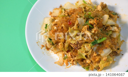 stir fried sukiyaki with egg and pork on white plate stir fried sukiyaki with egg and pork on white plate 141064087