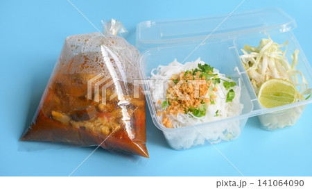 rice vermicelli with northern thai curry sauce in plastic bag 141064090