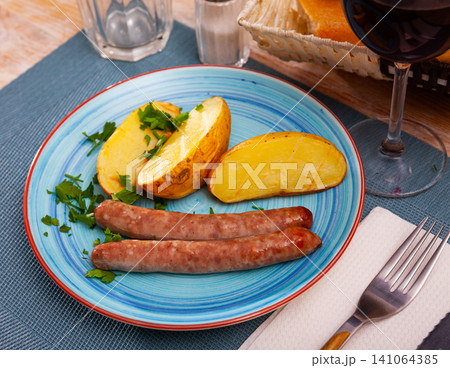 Eastern european cuisine - sausages with potatoes Eastern european cuisine - sausages with potatoes 141064385