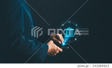 Businessman using smartphone for mobile banking online transaction with futuristic digital interface, securing finance technology, global currency transfer network concept Businessman using smartphone for mobile banking online transaction with futuristic digital interface, securing finance technology, global currency transfer network concept 141064923