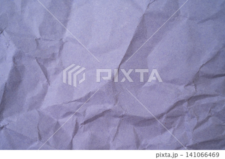 Full frame shot of purple crumpled paper sheet. Colored paper or construction paper, is a type of paper that comes in a wide range of colors. Full frame shot of purple crumpled paper sheet. Colored paper or construction paper, is a type of paper that comes in a wide range of colors. 141066469