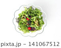 Fresh mixed green salad with tomatoes and black olives 141067512