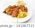 Fried fish with vegetables and mashed potatoes on a white plate 141067515