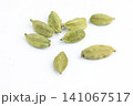Green cardamom pods on white background 141067517