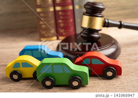 Hammer gavel judge with car vehicle accident, insurance coverage claim lawsuit court case. Hammer gavel judge with car vehicle accident, insurance coverage claim lawsuit court case. 141068947