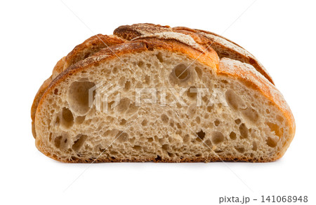 Sourdough baguette bread isolated on white background with clipping path. Sourdough baguette bread isolated on white background with clipping path. 141068948